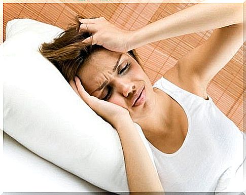 Woman suffering from headache