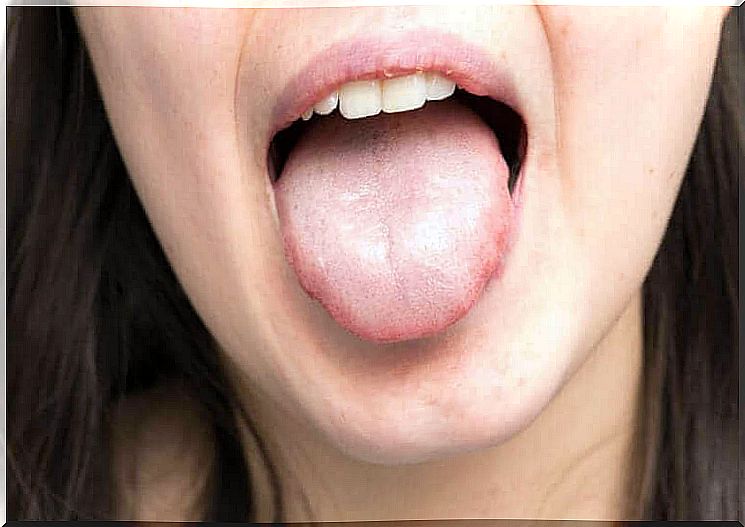 A woman sticking out her tongue